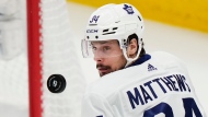 Toronto Maple Leafs' Auston Matthews (34) keeps his eye on the puck during second period NHL hockey action against the Tampa Bay Lightning in Tampa, Fla. on Wednesday, April 17, 2024. THE CANADIAN PRESS/Frank Gunn