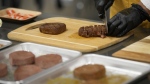 Plant-based steak product is cut up in a test kitchen in Boulder, Colo., on July 26, 2023. THE CANADIAN PRESS/AP, David Zalubowski