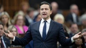 Conservative Leader Pierre Poilievre rises during question period, Tuesday, April 16, 2024 in Ottawa. The head of Canada's largest labour organization is calling Poilievre a "fraud" for portraying himself as a friend of the working class. THE CANADIAN PRESS/Adrian Wyld