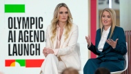 Lindsey Vonn, Olympic Skiing Champion, left, and Kirsty Burrows, Head of Safe Sport Unit IOC, right, speak at the International Olympic Committee launch of the Olympic AI Agenda at Lee Valley VeloPark, in London, Friday, April 19, 2024. The IOC will be presenting the envisioned impact that artificial intelligence can deliver for sport, and how the IOC intends to lead on the global implementation of AI within sport. (AP Photo/Kirsty Wigglesworth)
