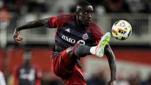 Toronto FC's Prince Osei Owusu (99) controls the ball against the New England Revolution during second half MLS soccer action in Toronto on Saturday, April 20, 2024. THE CANADIAN PRESS/Frank Gunn