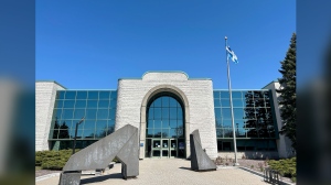 A lawyer for a former RCMP officer charged with helping China conduct foreign interference is asking the court to quash the indictment against him over a jurisdictional issue. The Longueuil, Que., provincial courthouse is seen on Monday, April 22, 2024. THE CANADIAN PRESS/Sidhartha Banerjee