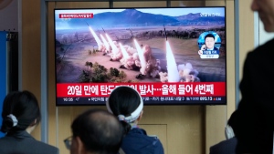 A TV screen shows a file image of North Korea's missiles launch during a news program at the Seoul Railway Station in Seoul, South Korea, Monday, April 22, 2024. (Ahn Young-joon / AP Photo)