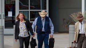 George Alan Kelly exits the Santa Cruz County Courthouse with defense attorney Kathy Lowthorp after the first day of his trial in Santa Cruz County Superior Court Friday, March 22, 2024 in Nogales, Ariz. (Angela Gervasi/Nogales International, via AP, File)