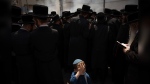 Ultra-Orthodox Jewish men and children burn leavened items in final preparation for the Passover holiday in the ultra-Orthodox Jewish town of Bnei Brak, near Tel Aviv, Israel, on Monday, April 22, 2024. THE CANADIAN PRESS/AP, Oded Balilty