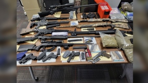 A large quantity of firearms and drugs was seized after search warrants were recently executed at two addresses in York Region. (YRP photo)