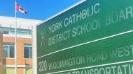 A sign for York Catholic District School Board can be seen above. (CTV News)