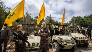 FILE: Fighters from the Lebanese militant group Hezbollah carry out a training exercise in Aaramta village in the Jezzine District, southern Lebanon, Sunday, May 21, 2023. (Hassan Ammar / The Associated Press)