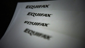 Equifax Canada says it's exploring how rent data could factor in to credit scores to help make credit and financial services accessible to more people. Equifax logos are shown on paper in Toronto on Oct.17, 2019. THE CANADIAN PRESS/Christopher Katsarov