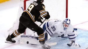 Toronto Maple Leafs goaltender Ilya Samsonov (35) makes a save against a shot by Boston Bruins centre John Beecher (19) during the second period of Game 2 of an NHL hockey Stanley Cup first-round playoff series, Monday, April 22, 2024, in Boston. Samsonov was stellar in making 27 saves Monday in Toronto's gutsy 3-2 victory that evened the first-round matchup at a game apiece following a 5-1 loss in Saturday's opener. THE CANADIAN PRESS/AP/Charles Krupa