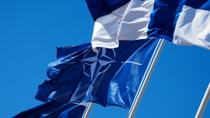 NATO and Finland flags flutter over the building of Ministry of Internal Affairs in Helsinki, Finland, Tuesday, April 4, 2023. (Sergei Grits / AP Photo)