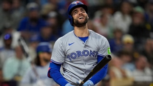 Toronto Blue Jays' Kevin Kiermaier reacts after striking out during the ninth inning of a baseball game against the San Diego Padres, Friday, April 19, 2024, in San Diego. (AP Photo/Gregory Bull) 