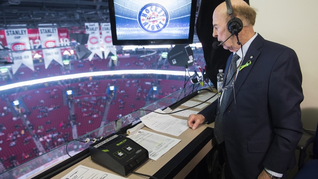 Legendary broadcaster Bob Cole looks out over the ice prior to calling his last NHL hockey game between the Montreal Canadiens and the Toronto Maple Leafs in Montreal, Saturday, April 6, 2019. Cole, a welcome voice for Canadian hockey fans for a half-century, has died at the age of 90. THE CANADIAN PRESS/Graham Hughes