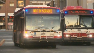 Shuttle buses are pictured during a disruption in subway service on the TTC Friday April 26, 2024. 