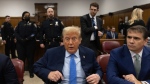 Former U.S. president Donald Trump appears at Manhattan criminal court before his trial in New York, Friday, April 26, 2024. (Jeenah Moon/Pool Photo via AP)