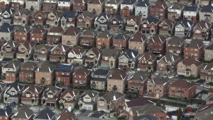 As more Canadians find themselves struggling to afford or find housing, the country's smallest province is the only one that can point to legislation recognizing housing as a human right. An aerial view of houses in Oshawa, Ont., is shown on Saturday, Nov. 11, 2017. THE CANADIAN PRESS/Lars Hagberg
