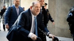 FILE - Harvey Weinstein arrives at a Manhattan courthouse as jury deliberations continue in his rape trial in New York, on Feb. 24, 2020. Weinstein will appear in a New York City court on Wednesday, May 1, 2024, according to the Manhattan district attorney's office. (AP Photo/John Minchillo, File)