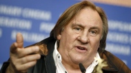 Actor Gerard Depardieu addresses the media during the press conference for the film 'Saint Amour' at the 2016 Berlinale Film Festival in Berlin, Germany, Friday, Feb. 19, 2016. 