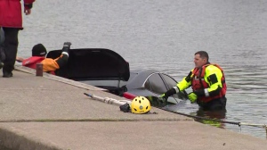 EXTENDED: Police extract car out of water