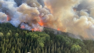 A wildfire burns in a forest near the town of Cochrane, Ont., in a June 6, 2023, handout photo. THE CANADIAN PRESS/HO-Ministry of Natural Resources and Forestry
