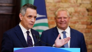 Ottawa Mayor Mark Sutcliffe, left, and Ontario Premier Doug Ford take part in a press conference at Ottawa City Hall on Monday, April 29, 2024. (Sean Kilpatrick/THE CANADIAN PRESS)