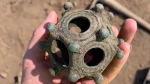 A rare Roman dodecahedron was found in Lincolnshire, England last summer and is set to go on display in the Lincoln Museum in Lincoln, England. (Norton Disney History and Archaeology Group via CNN Newsource)