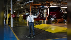 Prime Minister Justin Trudeau tours the Stellantis Windsor (Chrysler) Assembly plant in Windsor, Ont., Tuesday, January 17, 2023. The Opposition Conservatives are demanding to see contracts related to six electric vehicle projects underway in Canada, as they call for the protection of local union jobs.THE CANADIAN PRESS/Nicole Osborne