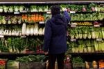 A customer shops for produce at a grocery store In Toronto on Friday, Feb. 2, 2024. THE CANADIAN PRESS/Cole Burston
