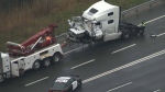 A transport truck involved in a collision after a police chase on Highway 401 in Whitby, Ont. 