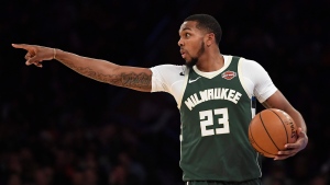 Milwaukee Bucks guard Sterling Brown calls a play during the second half of the team's NBA basketball game against the New York Knicks in New York, Saturday, Dec. 21, 2019. (AP Photo/Sarah Stier)