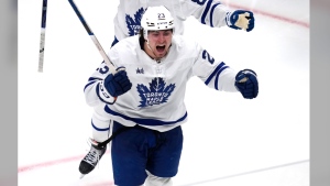 Toronto Maple Leafs left wing Matthew Knies (23) celebrates his game-winning goal off Boston Bruins goaltender Jeremy Swayman during overtime of Game 5 of an NHL hockey Stanley Cup first-round playoff series, Tuesday, April 30, 2024, in Boston. (AP Photo/Charles Krupa)