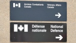 Veterans Affairs staff had to try to explain over the Easter weekend why one of their social media posts about the holiday didn't actually mention it by name. Signs for a National Defence and Veterans affairs office is pictured in St-Jean-sur-Richelieu on Monday Oct. 20, 2014. THE CANADIAN PRESS/Pascal Marchand