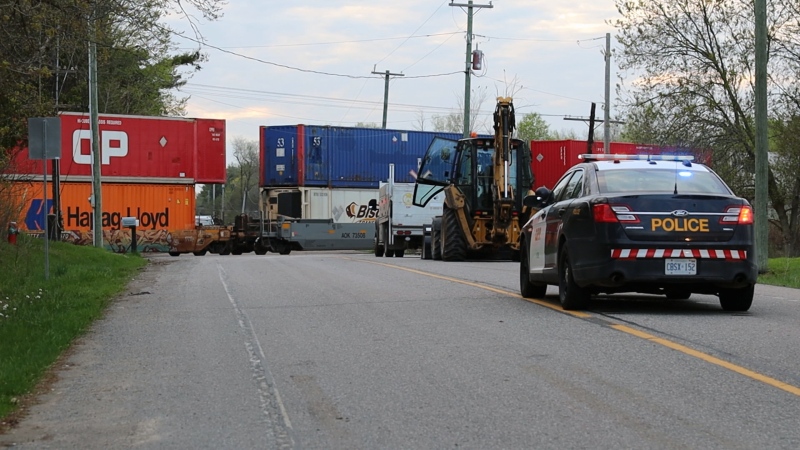 Police are on the scene of a collision between a car and a train in Caledon on Saturday, May 4, 2024. (Jacob Estrin for CTV News Toronto)