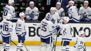 Teammates gather around Toronto Maple Leafs' Ilya Samsonov (35) after they lost to the Boston Bruins in overtime during Game 7 of an NHL hockey Stanley Cup first-round playoff series, Saturday, May 4, 2024, in Boston. (AP Photo/Michael Dwyer)