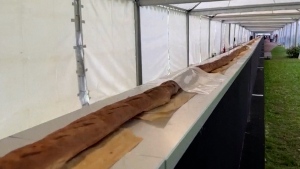 Bakers awarded for worlds longest baguette (Credit: 'Ville de Suresnes-Films de L'Arche')