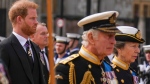 Prince Harry walks with King Charles III and Princes Anne behind the coffin of Queen Elizabeth II at Westminster Abbey, Monday Sept. 19, 2022. (Emilio Morenatti / AP Photo, Pool)