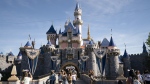 Visitors pass through Disneyland in Anaheim, Calif., on April 30, 2021.  (AP Photo/Jae C. Hong, File)