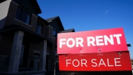 A new report says the asking rent for a home in Canada in April was up 9.3 per cent compared with a year ago, while a slight month-over-month increase was also recorded for the first time since January. For rent and for sale signs are displayed on a house in a new housing development in Ottawa on Friday, Oct. 14, 2022. THE CANADIAN PRESS/Sean Kilpatrick
