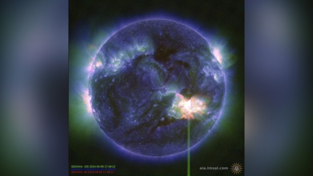 This image provided by NASA shows a solar flare, as seen in the bright flash in the lower right, captured by NASA’s Solar Dynamics Observatory on May 9, 2024. A severe geomagnetic storm watch has been issued for Earth starting Friday and lasting all weekend _ the first in nearly 20 years. (NASA/SDO via AP)