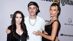 Pattie Mallette, Justin Bieber, and Hailey Bieber are seen here in 2020. Mallette on May 9 posted a video on her verified Instagram account of her reaction to her son and his wife, Hailey Bieber, going public with the news that they are expecting their first child. (Steve Granitz/WireImage/Getty Images via CNN Newsource)