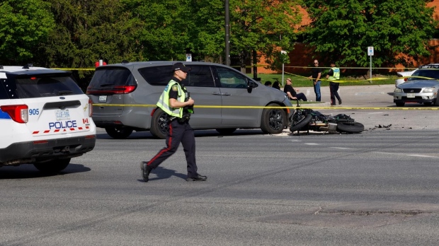 Police are on the scene of a collision between a car and a motorcycle in Mississauga on Friday, May 10, 2024. (Jacob Estrin for CTV News Toronto)