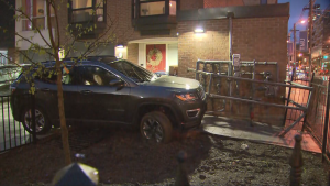 Car crashes into a home in downtown Toronto on Saturday, May 11, 2024.