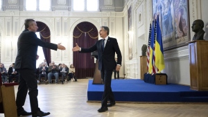 U.S. Secretary of State Antony Blinken, right, leaves the stage after addressing students and and professors in Igor Sikorsky Polytechnic Institute in Kyiv, Ukraine. (Brendan Smialowski/AP Photo)