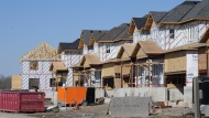 Canada Mortgage and Housing Corp. says the annual pace of housing starts in April edged down one per cent compared with March. A new housing development is shown in Belleville, Ont., on Friday, March 1, 2024. THE CANADIAN PRESS/Chris Young