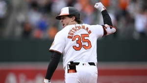 Baltimore Orioles' Adley Rutschman celebrates his walk-off two-run home run as he rounds the bases in the ninth inning of a baseball game against the Toronto Blue Jays, Wednesday, May 15, 2024, in Baltimore. The home run was reviewed and upheld. The Orioles won 3-2. (AP Photo/Nick Wass)