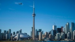 The Toronto skyline is photographed from the Hanlan's Point Ferry as it travels back to the city on Thursday, June 21, 2018. THE CANADIAN PRESS/ Tijana Martin 
