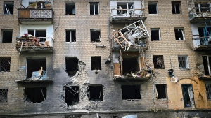 In this photo provided by Kherson Regional Military Administration, a destroyed apartment building is seen at the site of a Russian army attack with guided aerial bombs in Kherson, Ukraine, Thursday, May 15, 2024. (Kherson Regional Military Administration via AP)