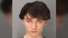 Aiden Pleterski, 25, in a mug shot taken by Durham police after he was arrested for fraud over $5,000 and money laundering.

