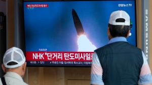 A TV screen shows a file image of North Korea's missile launch during a news program at the Seoul Railway Station in Seoul, South Korea, Friday, May 17, 2024. (AP Photo/Ahn Young-joon)