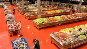 Shoppers browse goods in the produce section of a Toronto Loblaws on Friday, May 3, 2024. THE CANADIAN PRESS/Chris Young